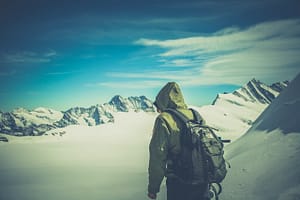 a hiker in a snowy mountain